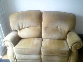 Freecycle 2 x gold sofas.