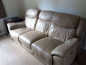 Freecycle Cream leather reclining sofa.