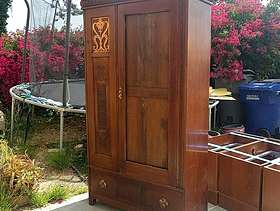 Freecycle FREE Wood Armoire with ornate detail. And cat door