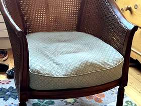 Freecycle Rose wood, rattan chair.