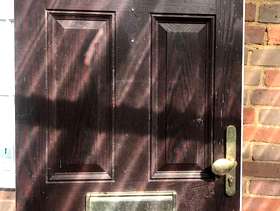 Freecycle Brown wooden front door.
