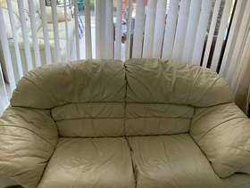 Freecycle Cream leather two seater couch.