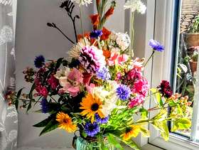 Freecycle Heavy glass vase full of fresh flowers