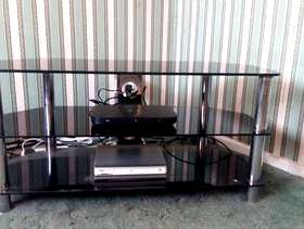 Freecycle Black glass tv stand.