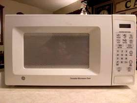 Freecycle White GE microwave in great condition for free